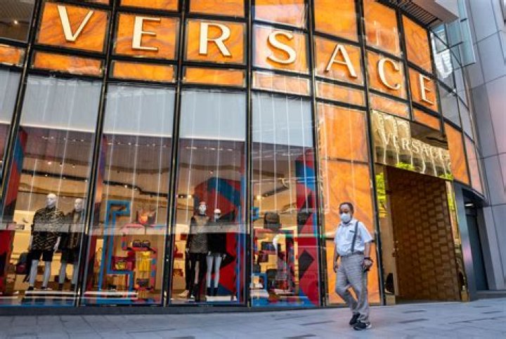 Is the Versace company still in business?