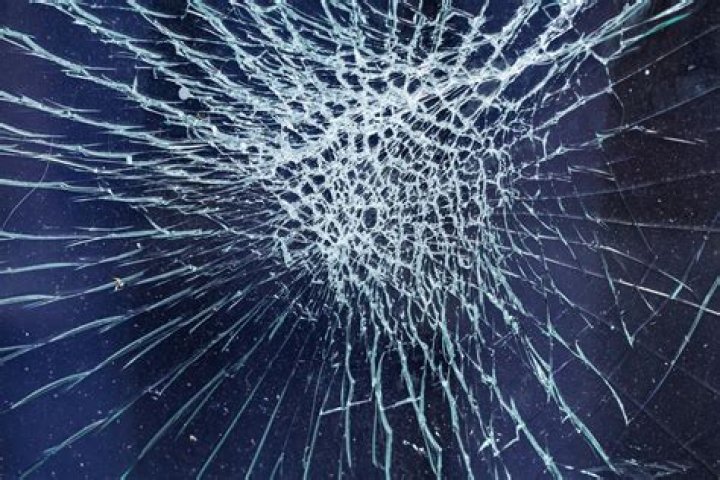 What does the breaking of the glass symbolize?