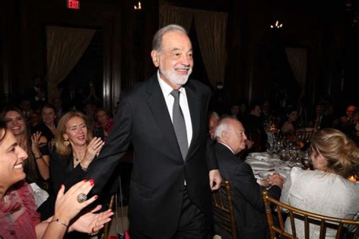 Where did Carlos Slim grow up?